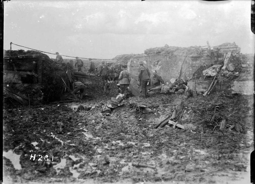 New Zealand soldiers in the ruins of the 'Capitol', which briefly became the New Zealand Division's headquarters.